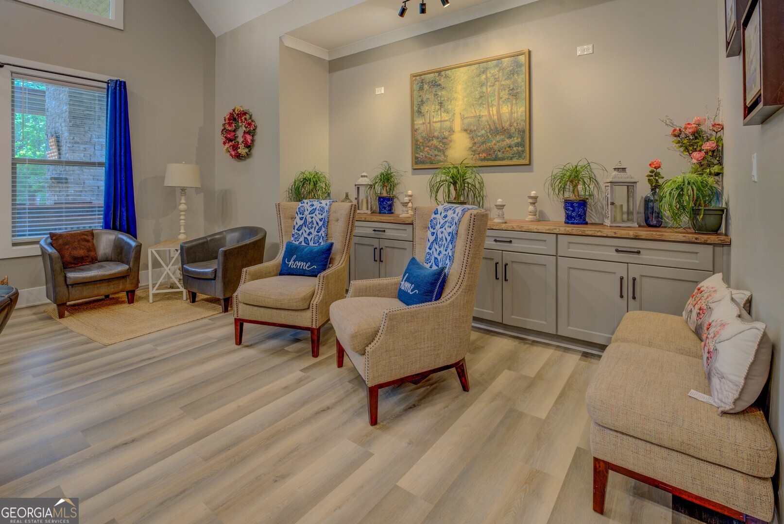 70 McDonald Road Covington, GA 30014 - Photo 23 of 84 a living room with furniture and a wooden floor