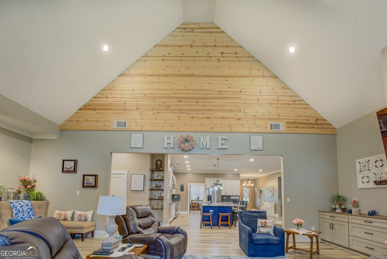 70 McDonald Road Covington, GA 30014 - Photo 28 of 84 a living room with furniture and a wooden floor