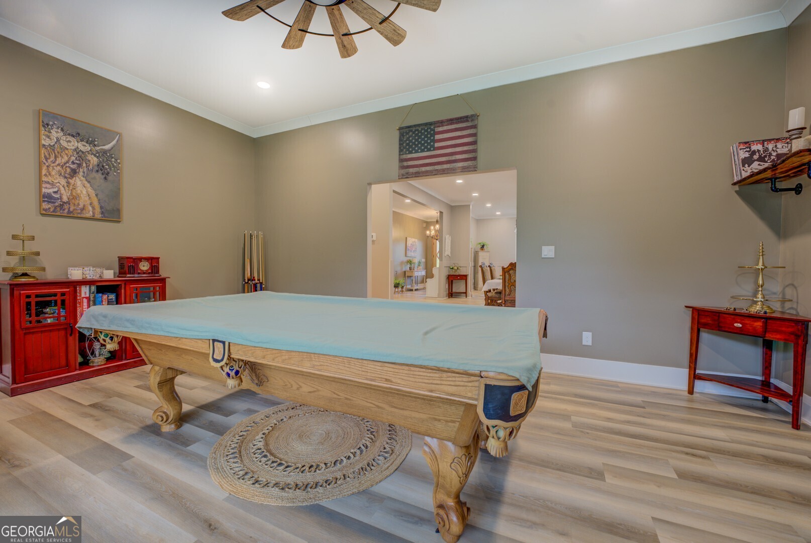 70 McDonald Road Covington, GA 30014 - Photo 43 of 84 a room with furniture and wooden floor