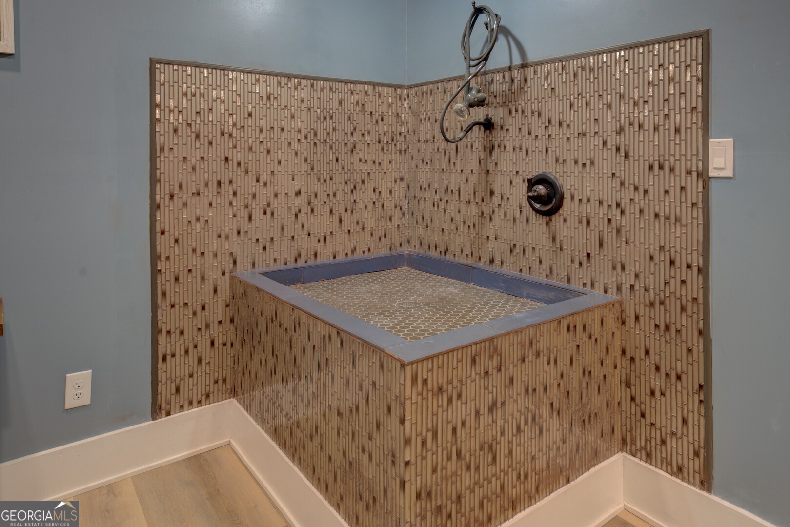 70 McDonald Road Covington, GA 30014 - Photo 47 of 84 a bathroom with a shower and a sink