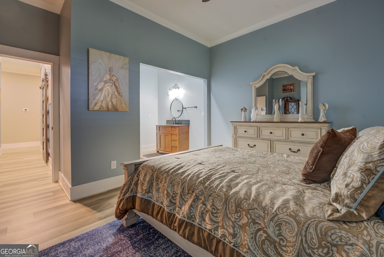 70 McDonald Road Covington, GA 30014 - Photo 49 of 84 a bedroom with a bed and a dresser