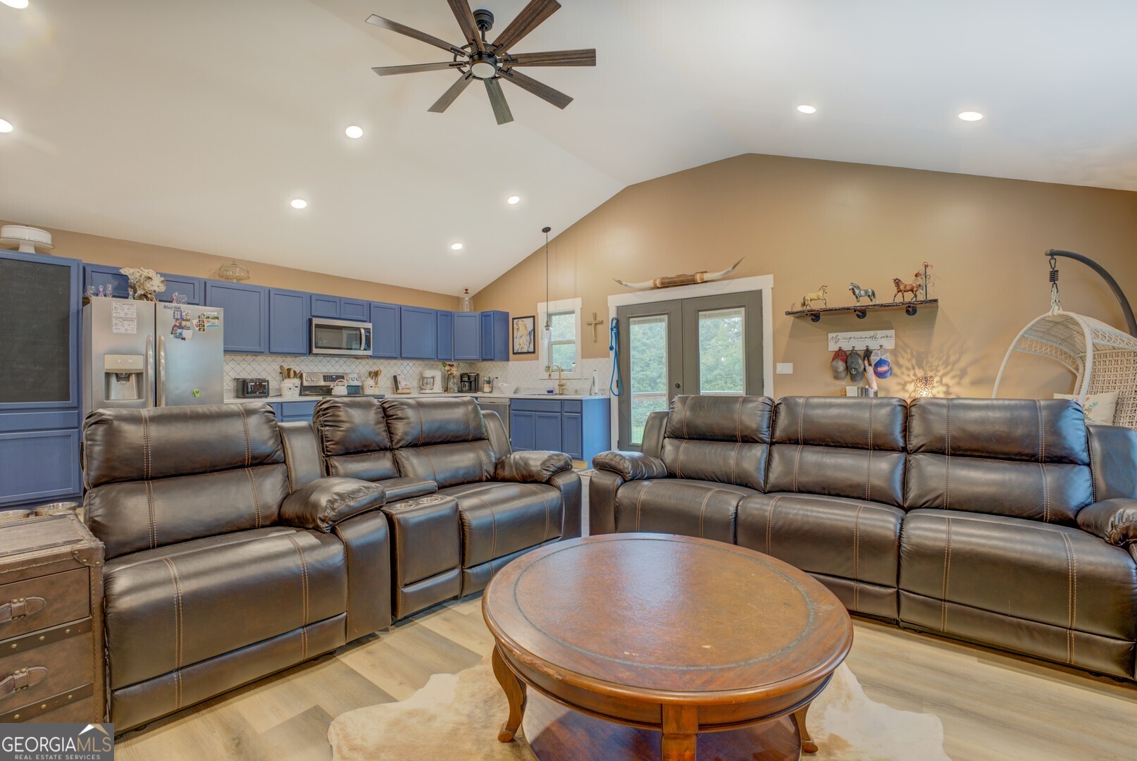 70 McDonald Road Covington, GA 30014 - Photo 63 of 84 a living room with furniture and a view of kitchen