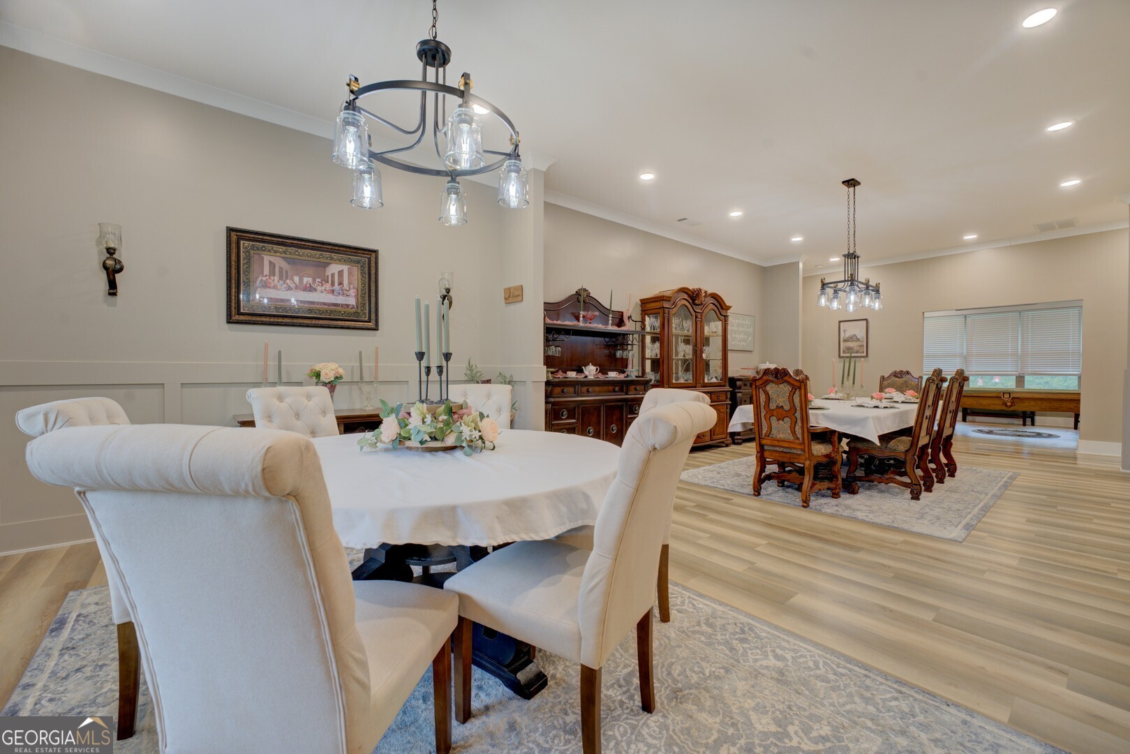 70 McDonald Road Covington, GA 30014 - Photo 9 of 84 a view of a dining room with furniture and wooden floor