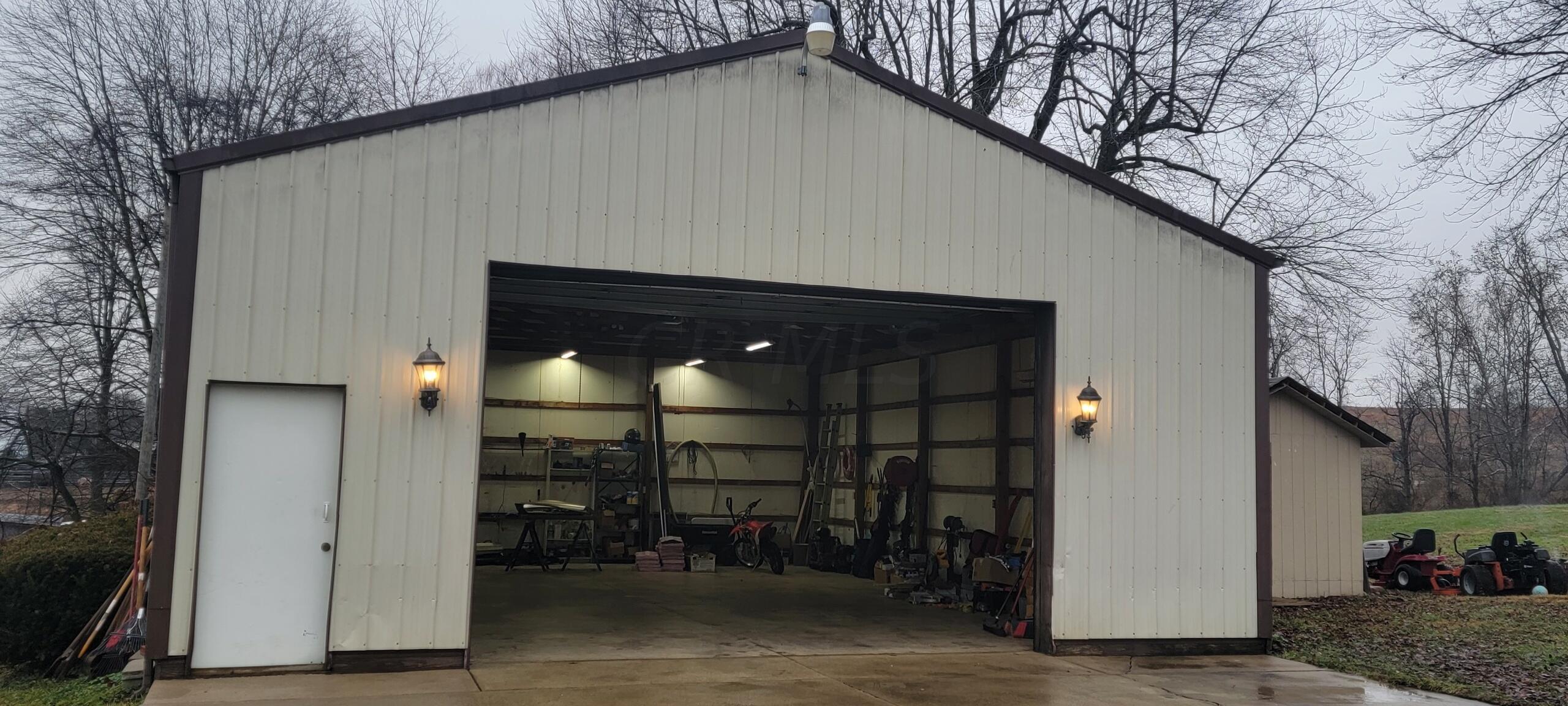 8224 Bull Run Road Vinton, OH 45686 - Photo 29 of 32 Garage with Door Open