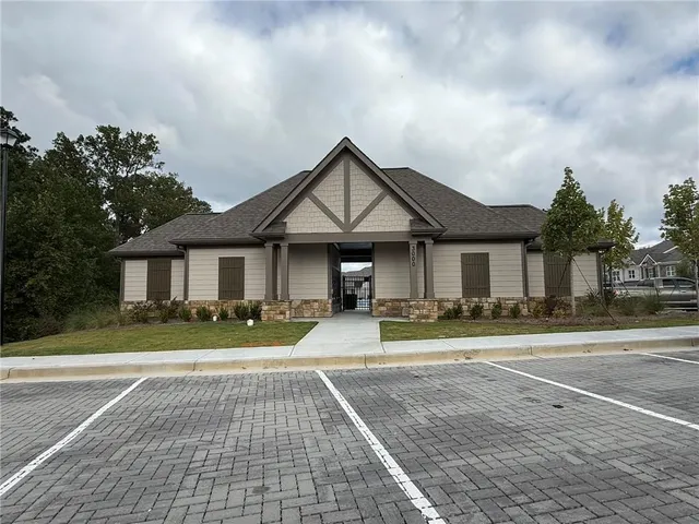 a view of swimming pool with outdoor seating