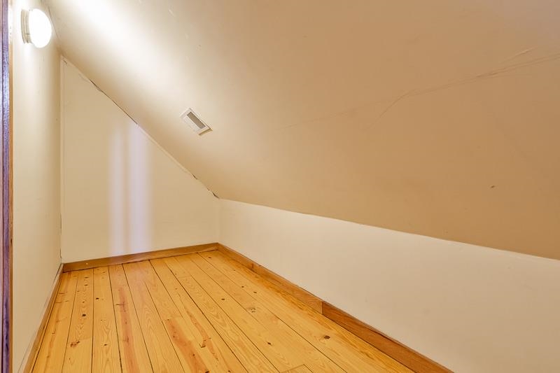 7334 Hawthorne Ridge Roscoe, IL 61073 - Photo 24 of 79 a view of a room with wooden floor and white walls
