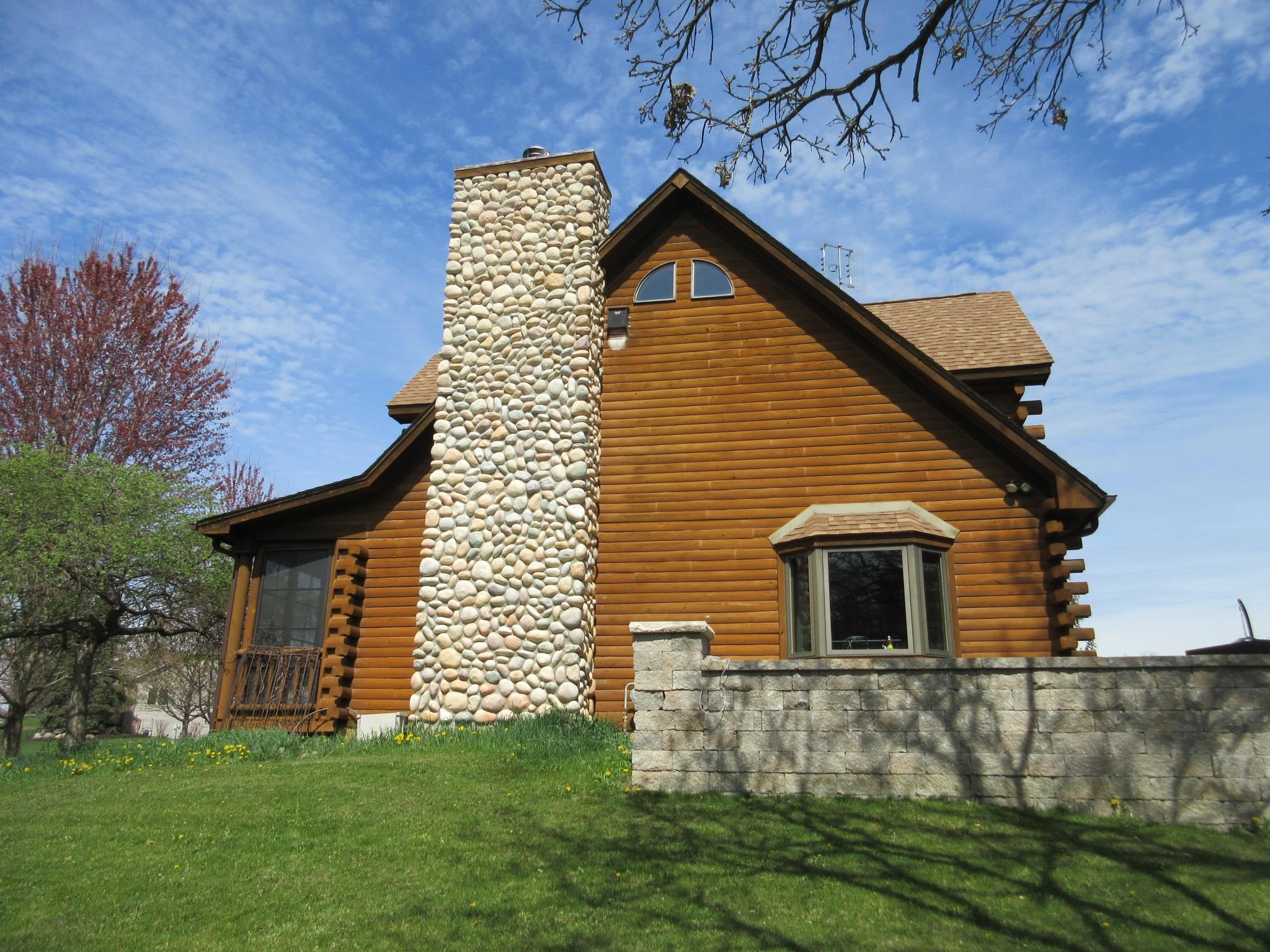 7334 Hawthorne Ridge Roscoe, IL 61073 - Photo 49 of 79 a view of front of house with a yard