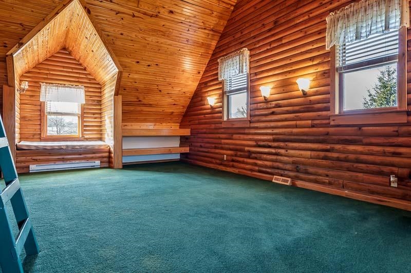 7334 Hawthorne Ridge Roscoe, IL 61073 - Photo 67 of 79 a view of a backyard with a garden