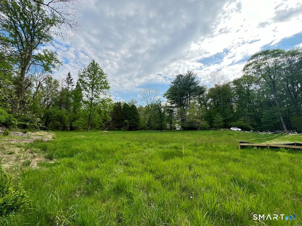 180 Catamount Road Fairfield, CT 06824 - Photo 4 of 5 a view of an outdoor space and yard