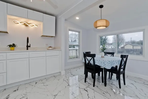 a view of a dining room with furniture