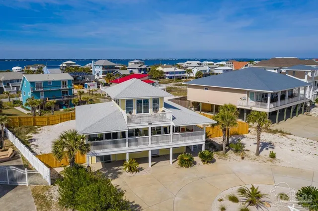 an aerial view of a house with a terrace