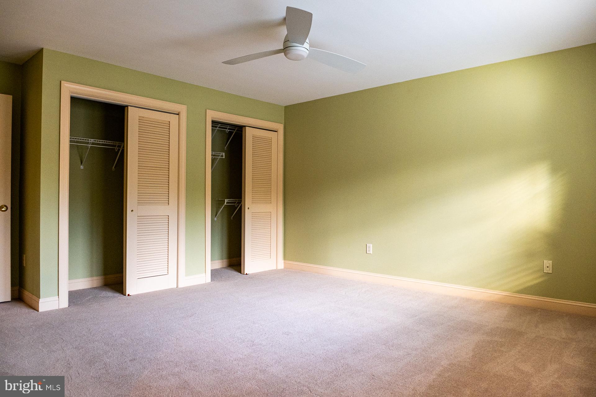 2 Garden Path, Unit 14 Doylestown, PA 18901 - Photo 17 of 36 Bright and airy green bedroom space.