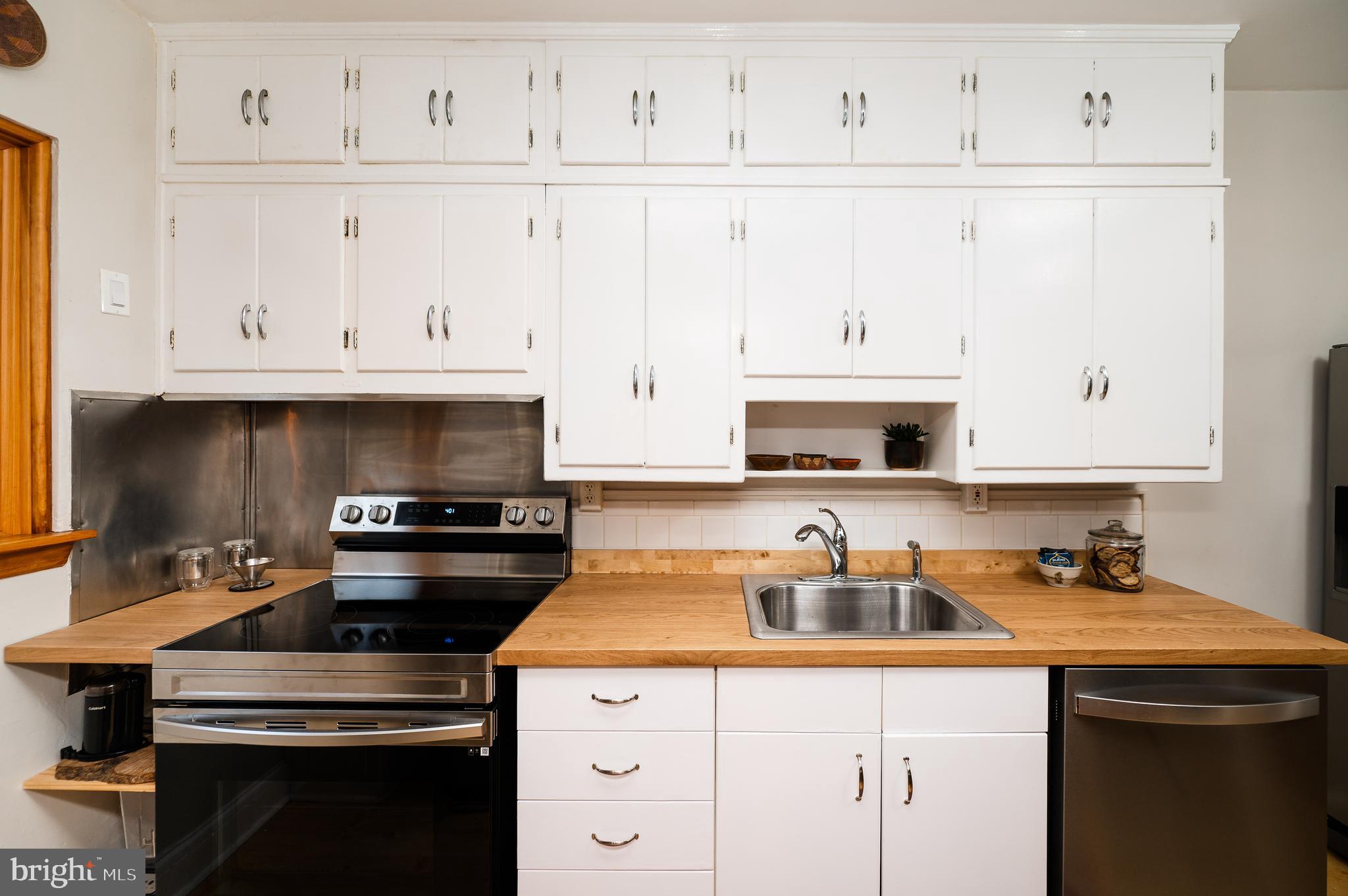 3727 Rexmere Road Baltimore, MD 21218 - Photo 18 of 56 Stainless appliances & butcher block counters...