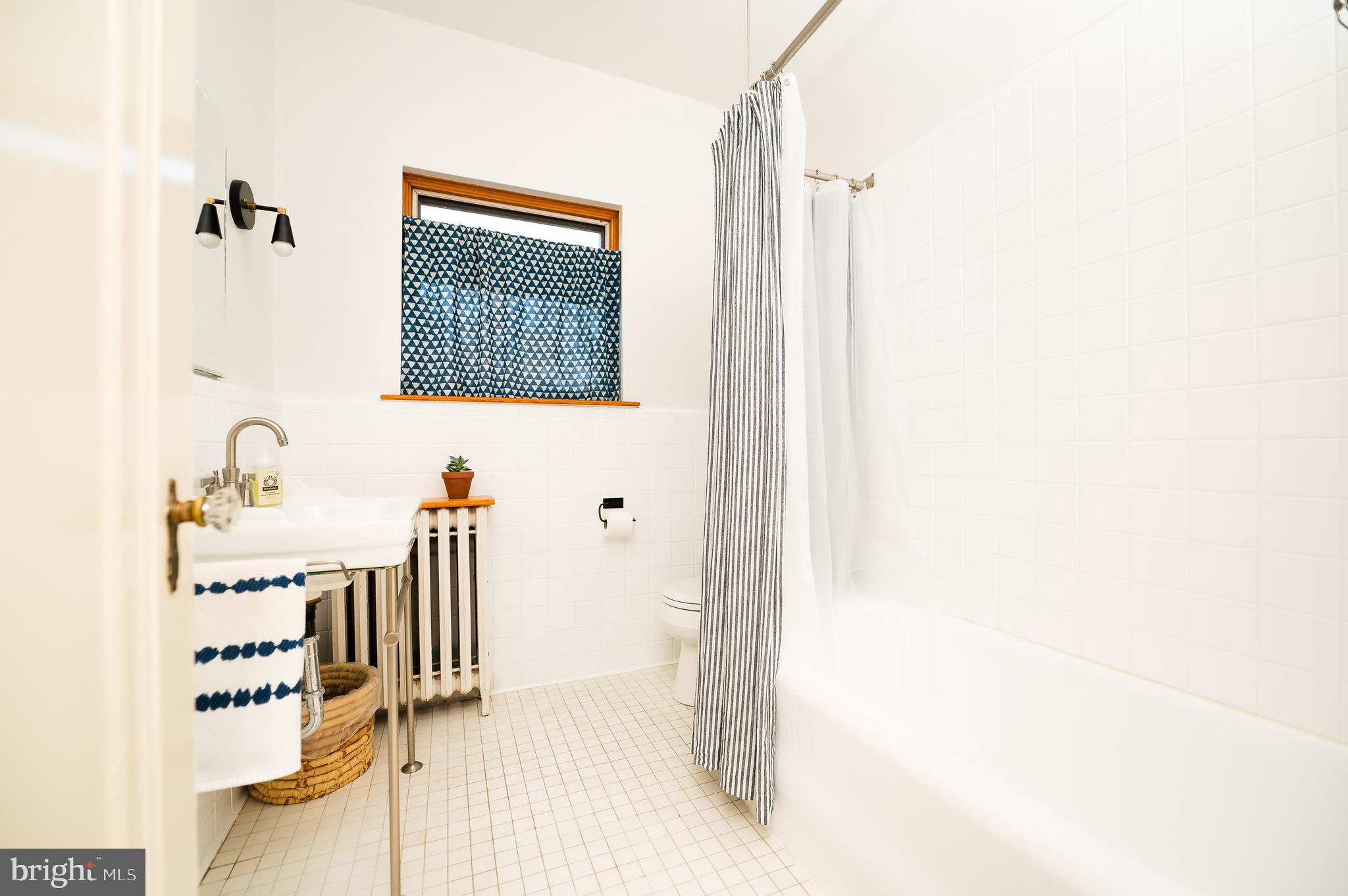 3727 Rexmere Road Baltimore, MD 21218 - Photo 25 of 56 Light-filled bath with lasting style and design...