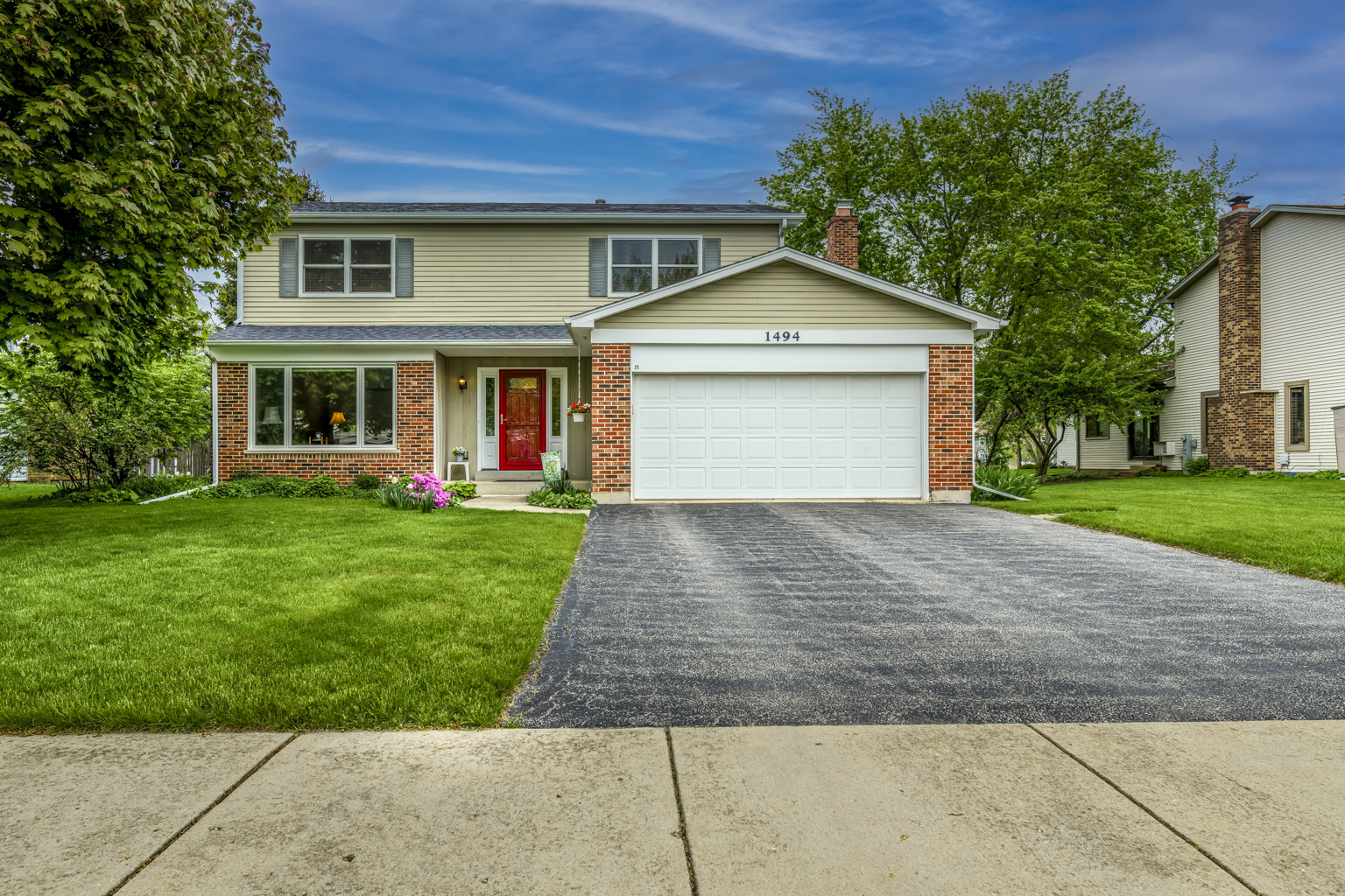 1494 Applegate Drive Naperville, IL 60565 - Photo 1 of 35 a front view of house with yard and green space