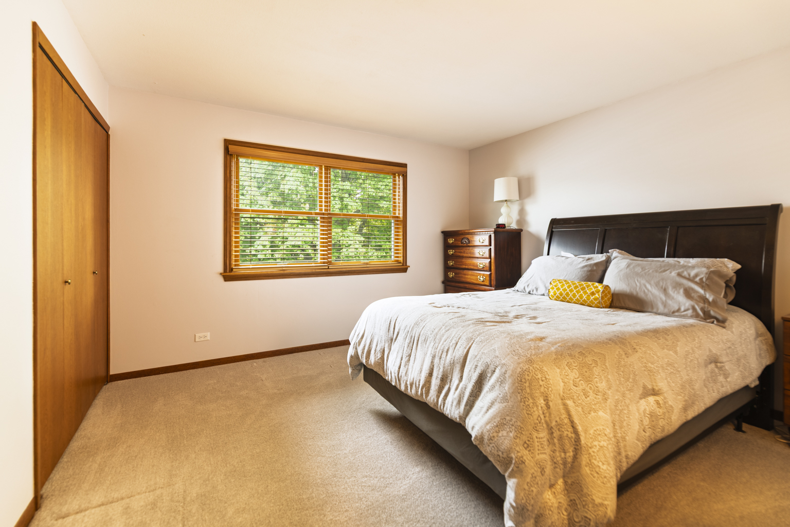 1494 Applegate Drive Naperville, IL 60565 - Photo 18 of 35 a large bed sitting in a bedroom next to a window