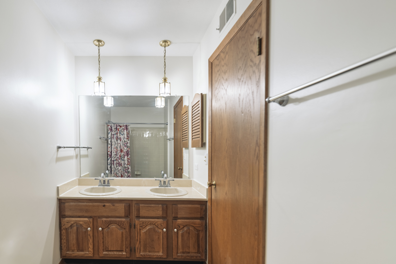1494 Applegate Drive Naperville, IL 60565 - Photo 21 of 35 a bathroom with a granite countertop sink a mirror and shower
