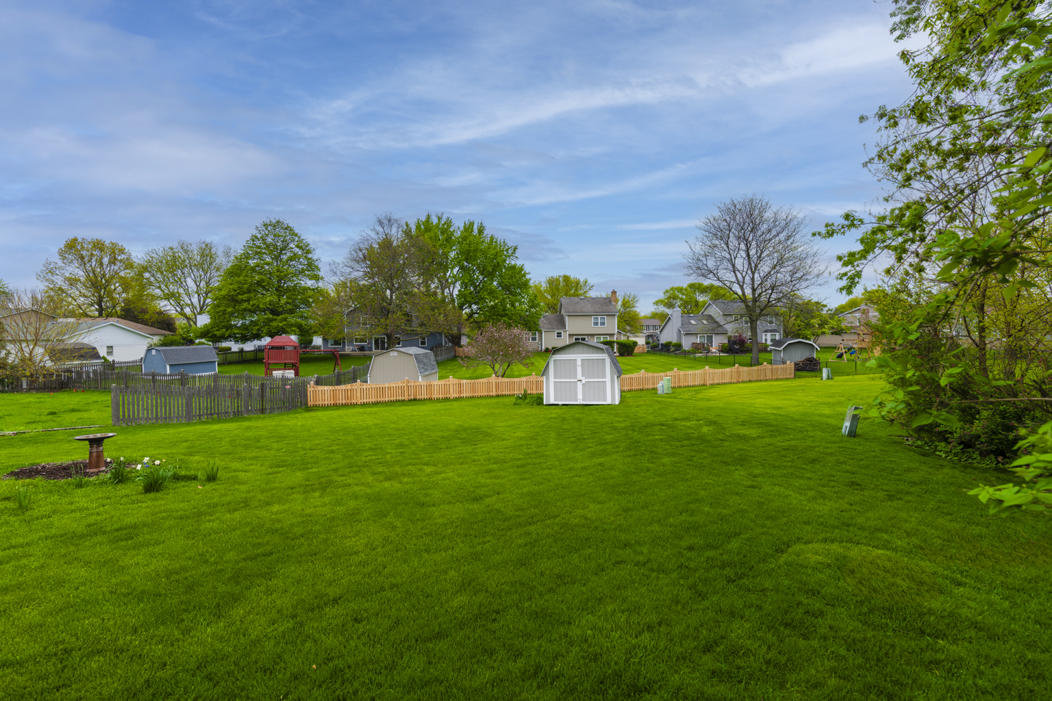 1494 Applegate Drive Naperville, IL 60565 - Photo 26 of 35 a view of a garden with houses
