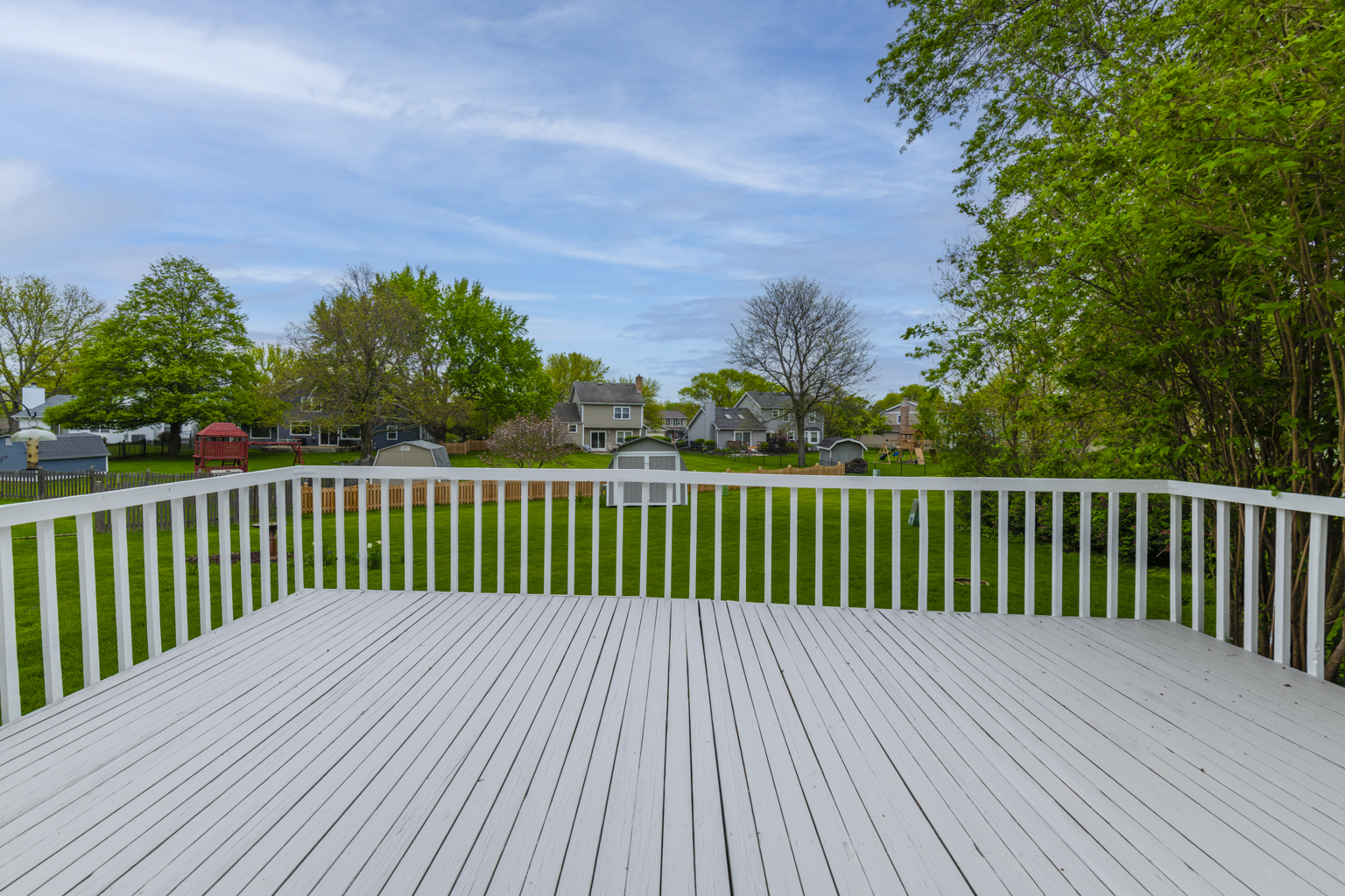 1494 Applegate Drive Naperville, IL 60565 - Photo 27 of 35 a balcony with trees in front of it
