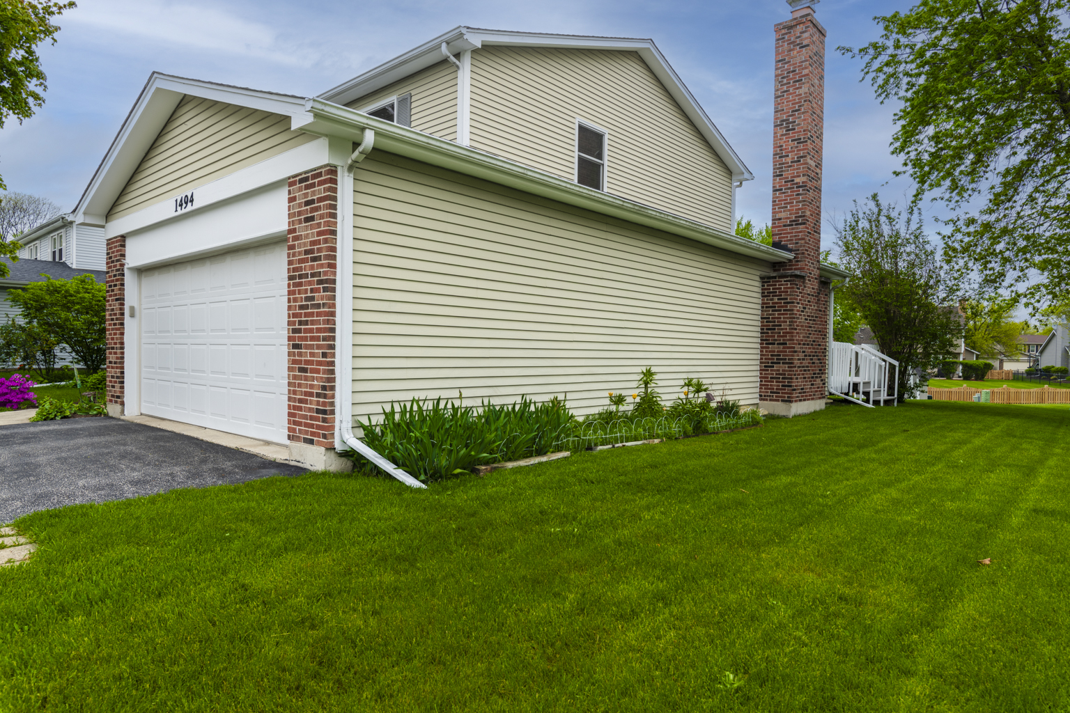 1494 Applegate Drive Naperville, IL 60565 - Photo 32 of 35 a front view of house with yard and green space