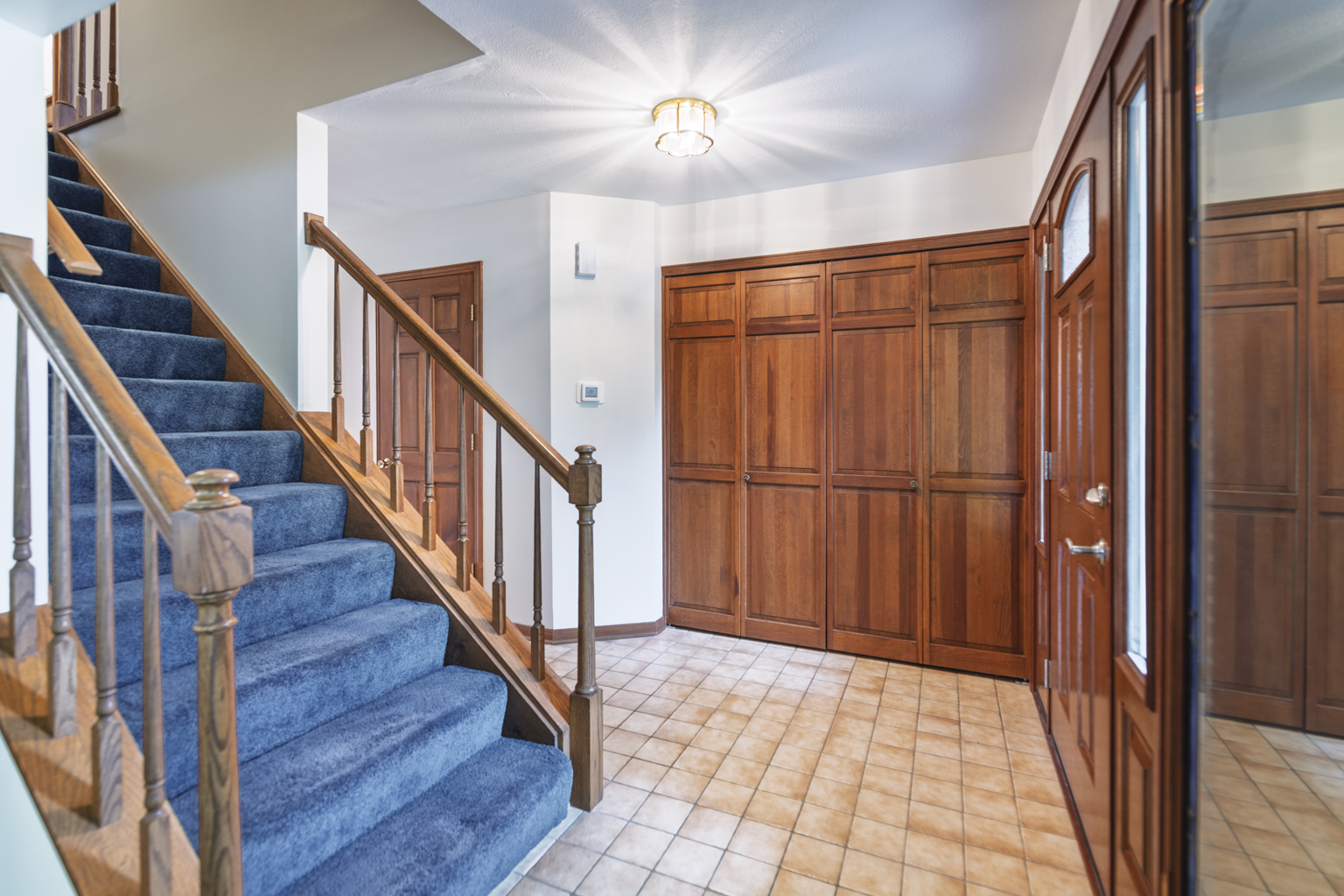 1494 Applegate Drive Naperville, IL 60565 - Photo 6 of 35 a view of entryway with wooden floor and stairs