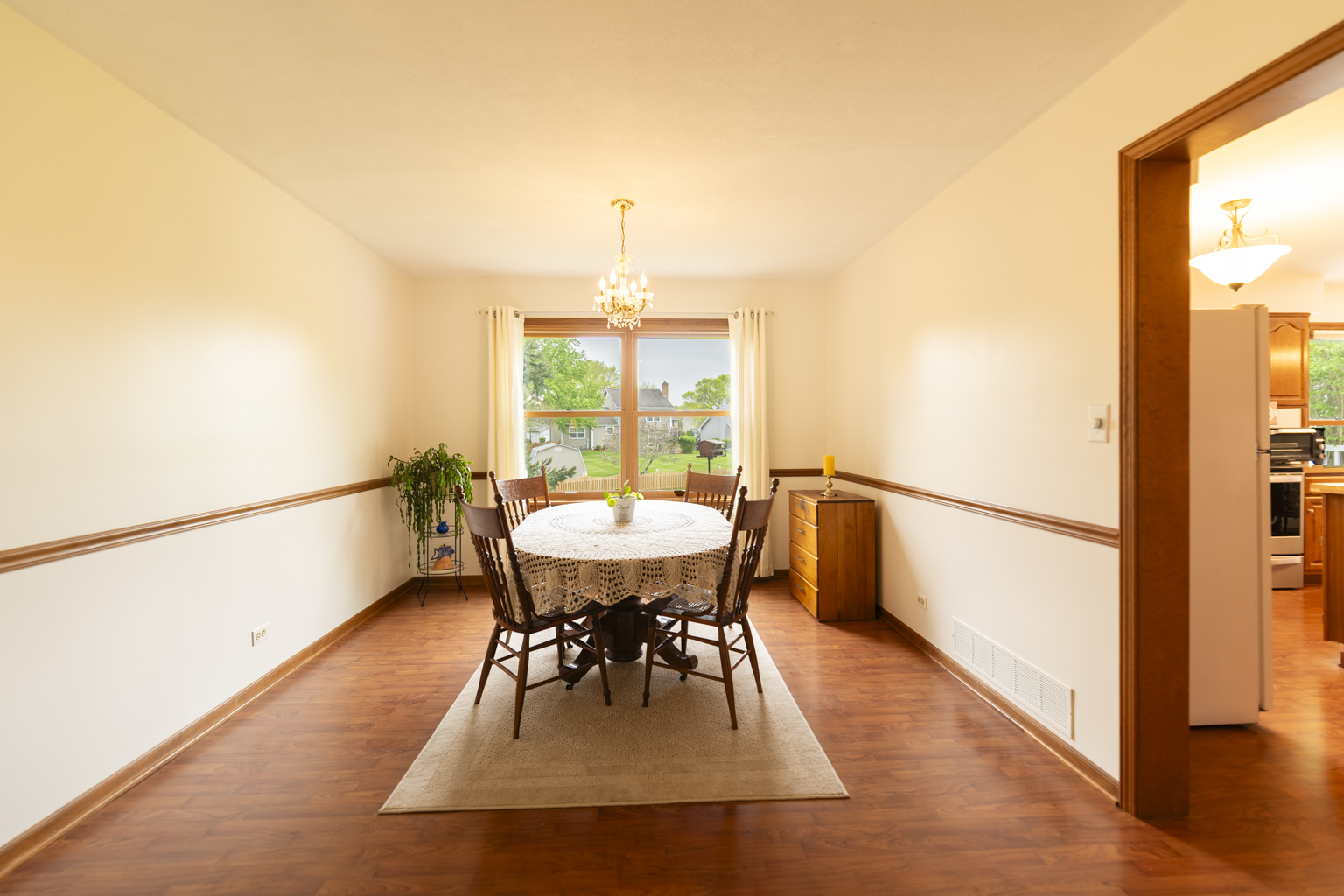 1494 Applegate Drive Naperville, IL 60565 - Photo 9 of 35 a view of a dining room with furniture window and wooden floor