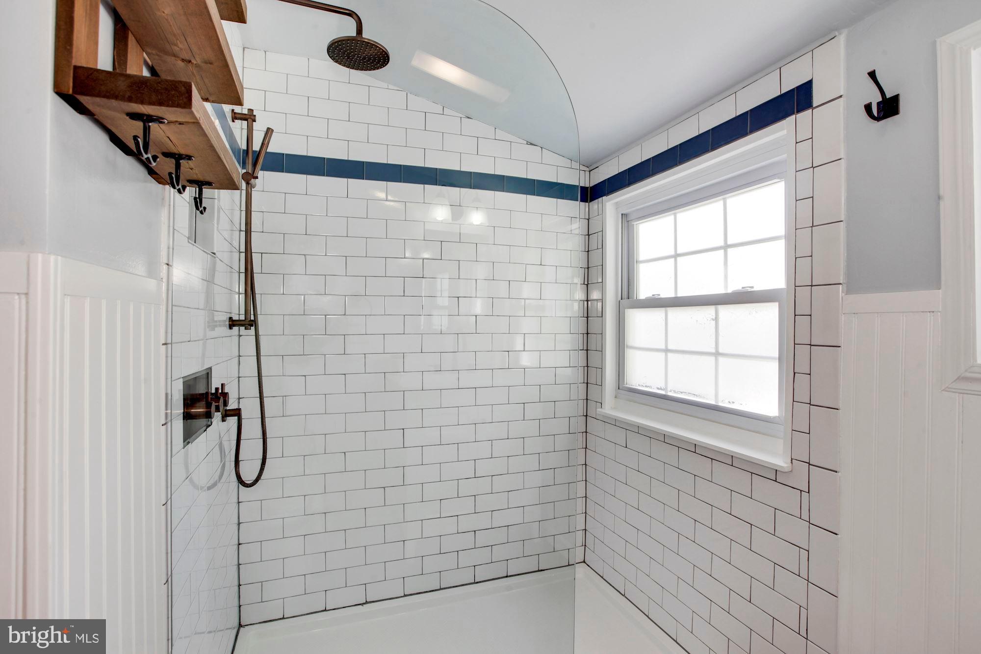708 Justin Way Silver Spring, MD 20901 - Photo 19 of 30 Bronze shower fixtures in the master