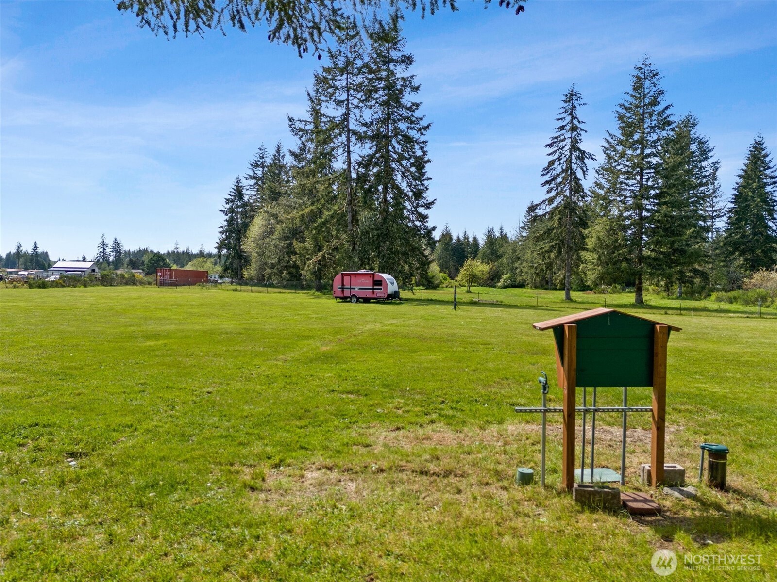 1982 West Ford Loop Road Elma, WA 98541 - Photo 13 of 15 a view of a water fountain and a big yard