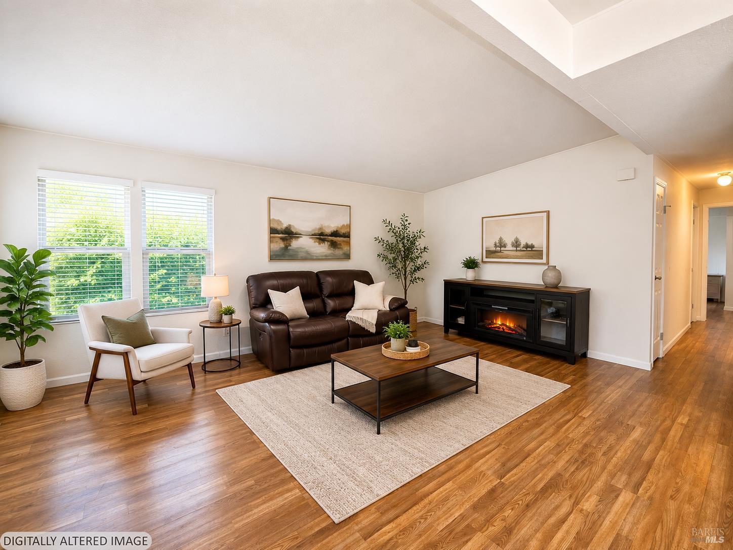1945 Piner Road, Unit 16 Santa Rosa, CA 95403 - Photo 5 of 18 a living room with furniture and a fireplace