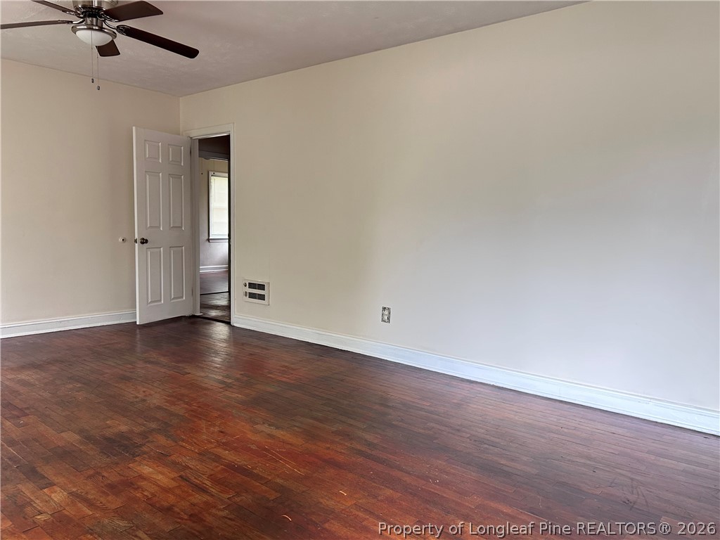 5200 Cypress Road Fayetteville, NC 28304 - Photo 8 of 9 wooden floor in an empty room