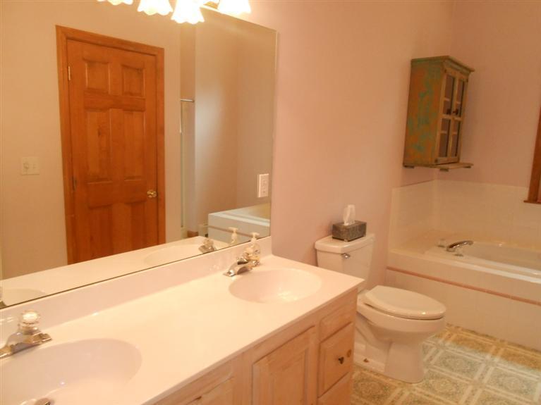 9 Bunker Circle Sandwich, MA 02563 - Photo 12 of 19 a bathroom with a sink a toilet and shower