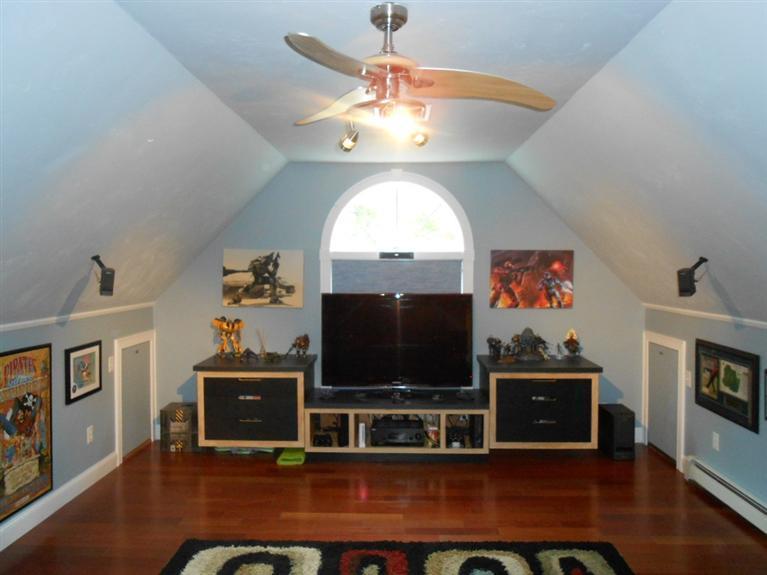 9 Bunker Circle Sandwich, MA 02563 - Photo 15 of 19 a room with furniture and a flat screen tv