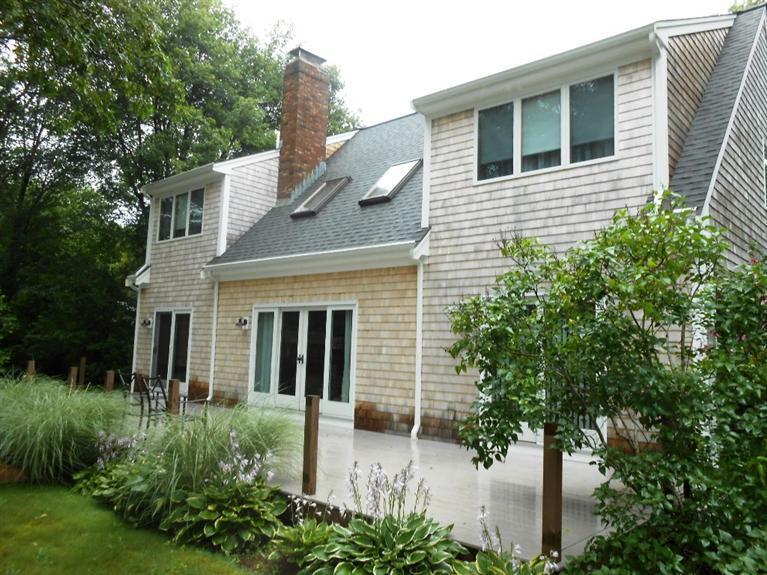9 Bunker Circle Sandwich, MA 02563 - Photo 19 of 19 a front view of a house with plants