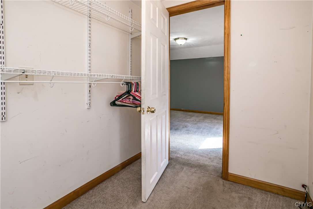 614 Fitch Street Oneida, NY 13421 - Photo 10 of 15 Primary bedroom walk-in closet