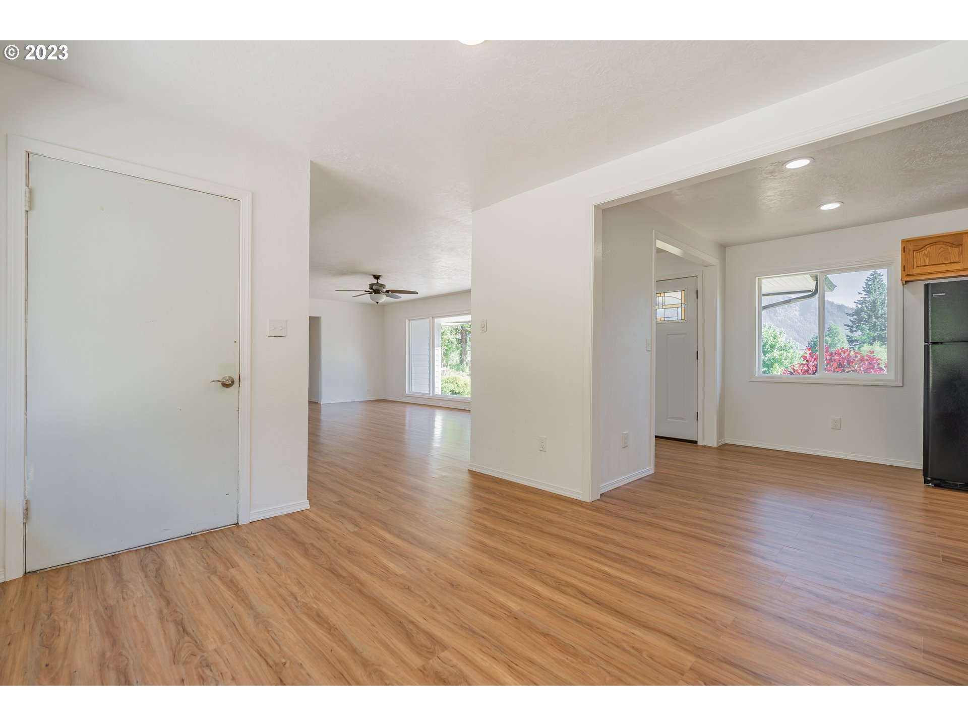 721 Northwest Gropper Road Stevenson, WA 98648 - Photo 12 of 45 a view of an empty room with window and wooden floor