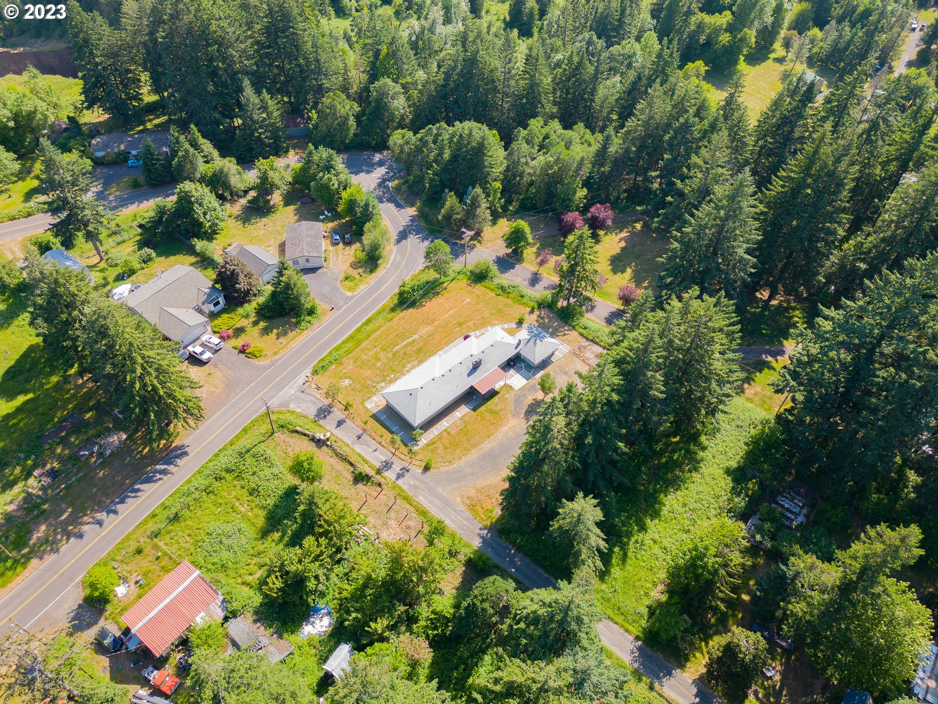 721 Northwest Gropper Road Stevenson, WA 98648 - Photo 3 of 45 an aerial view of a house with a yard and swimming pool