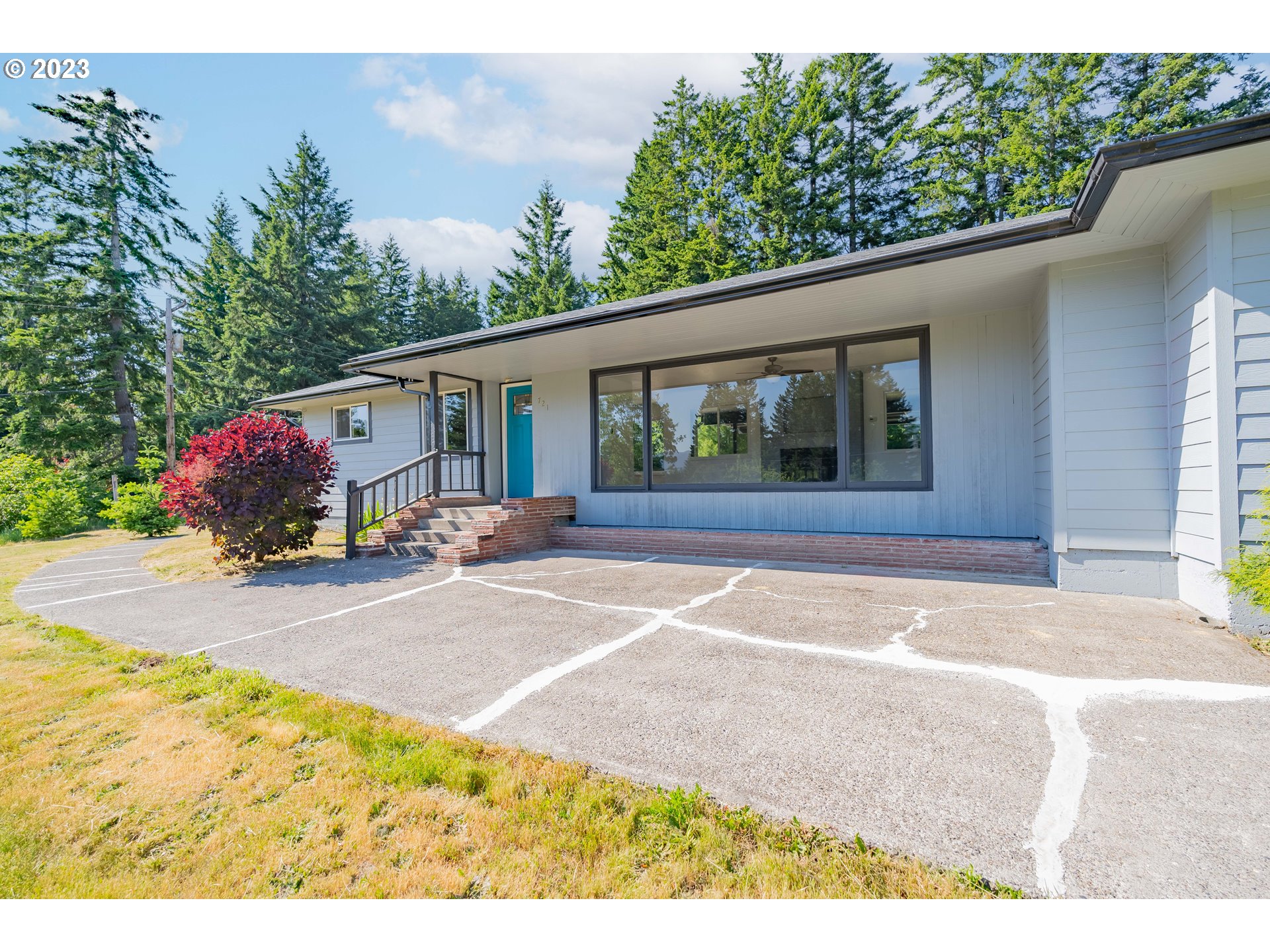 721 Northwest Gropper Road Stevenson, WA 98648 - Photo 45 of 45 a front view of a house with a yard and garage