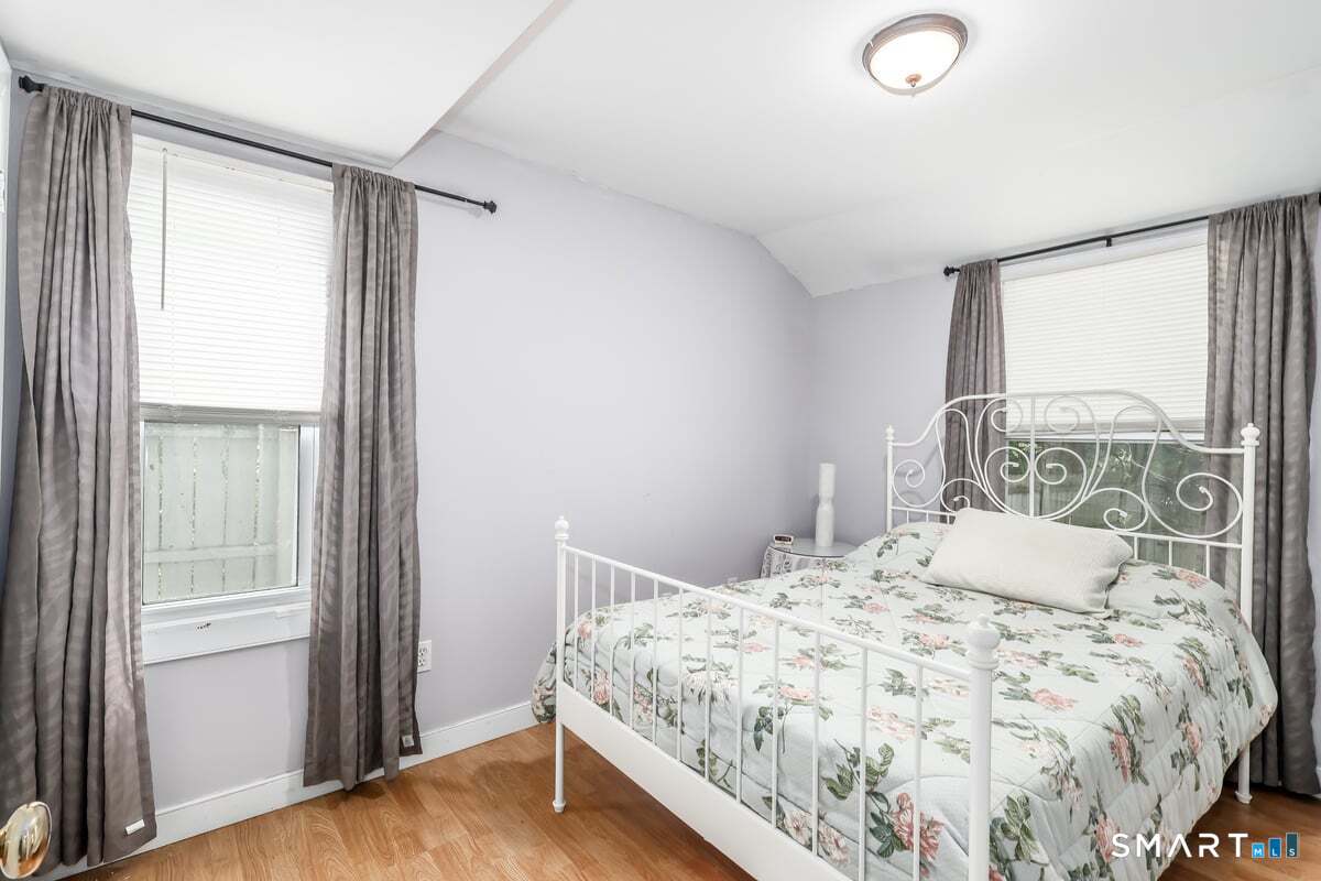 70 Dodgingtown Road Bethel, CT 06801 - Photo 15 of 27 a bedroom with a bed and a window