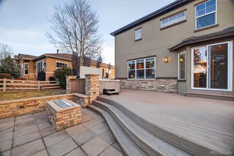 a view of a building with outdoor seating