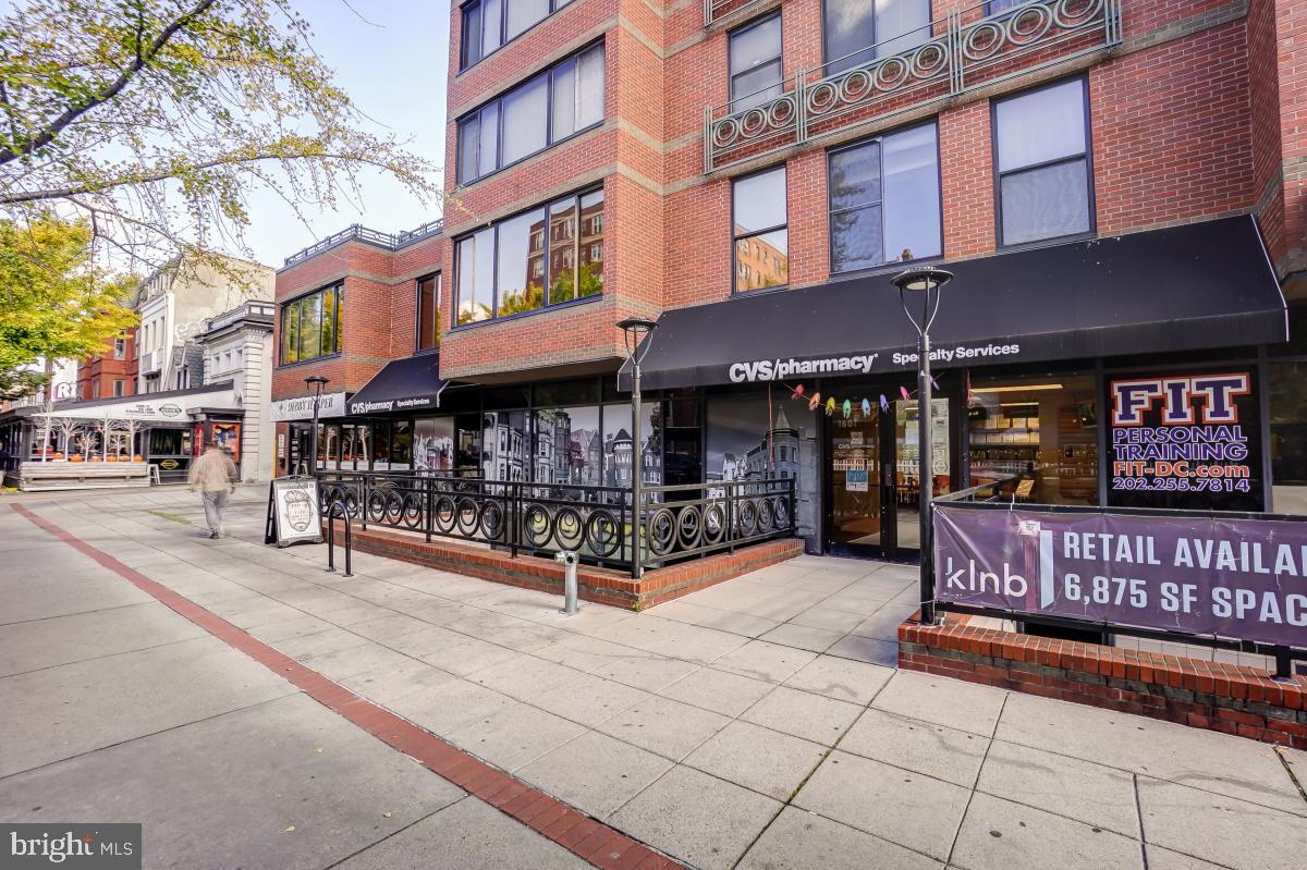 1954 Columbia Road Northwest, Unit 308 Washington, DC 20009 - Photo 37 of 51 a view of a cafe with sitting area