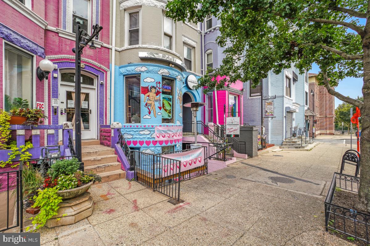 1954 Columbia Road Northwest, Unit 308 Washington, DC 20009 - Photo 45 of 51 a building with sign broad in front of it