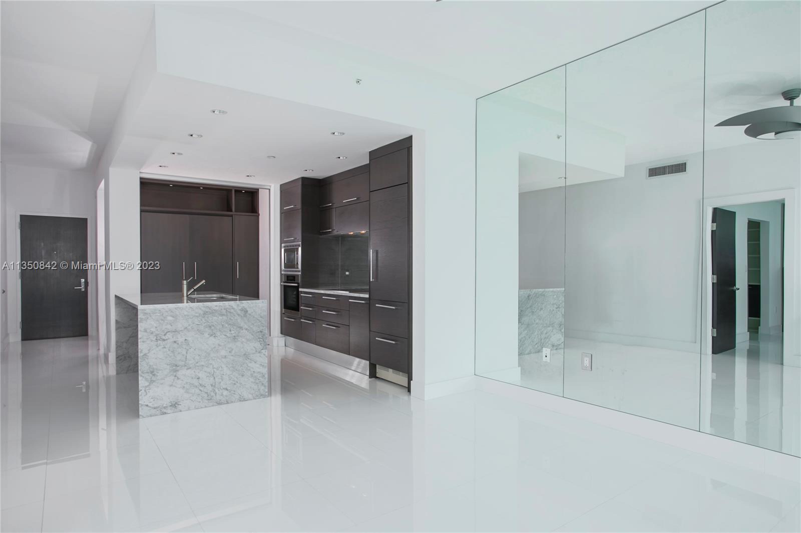 900 Biscayne Boulevard, Unit 4804 Miami, FL 33132 - Photo 7 of 17 a bathroom with a bathtub and a shower