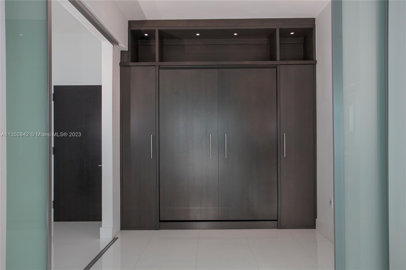 900 Biscayne Boulevard, Unit 4804 Miami, FL 33132 - Photo 9 of 17 a view of cupboard