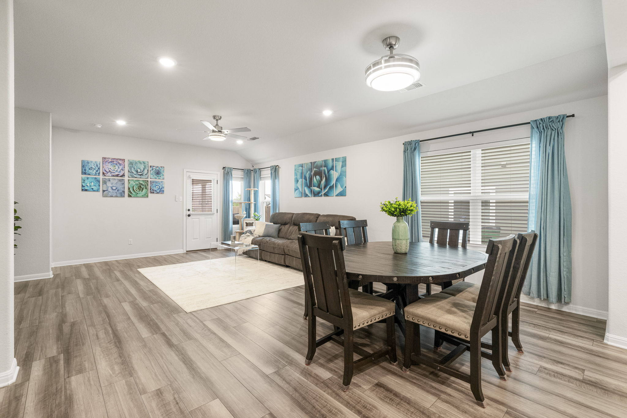 19412 Forman Drive Pflugerville, TX 78660 - Photo 11 of 34 The dining area is perfectly positioned between the kitchen and living room, creating a natural space for everyday meals and gatherings.