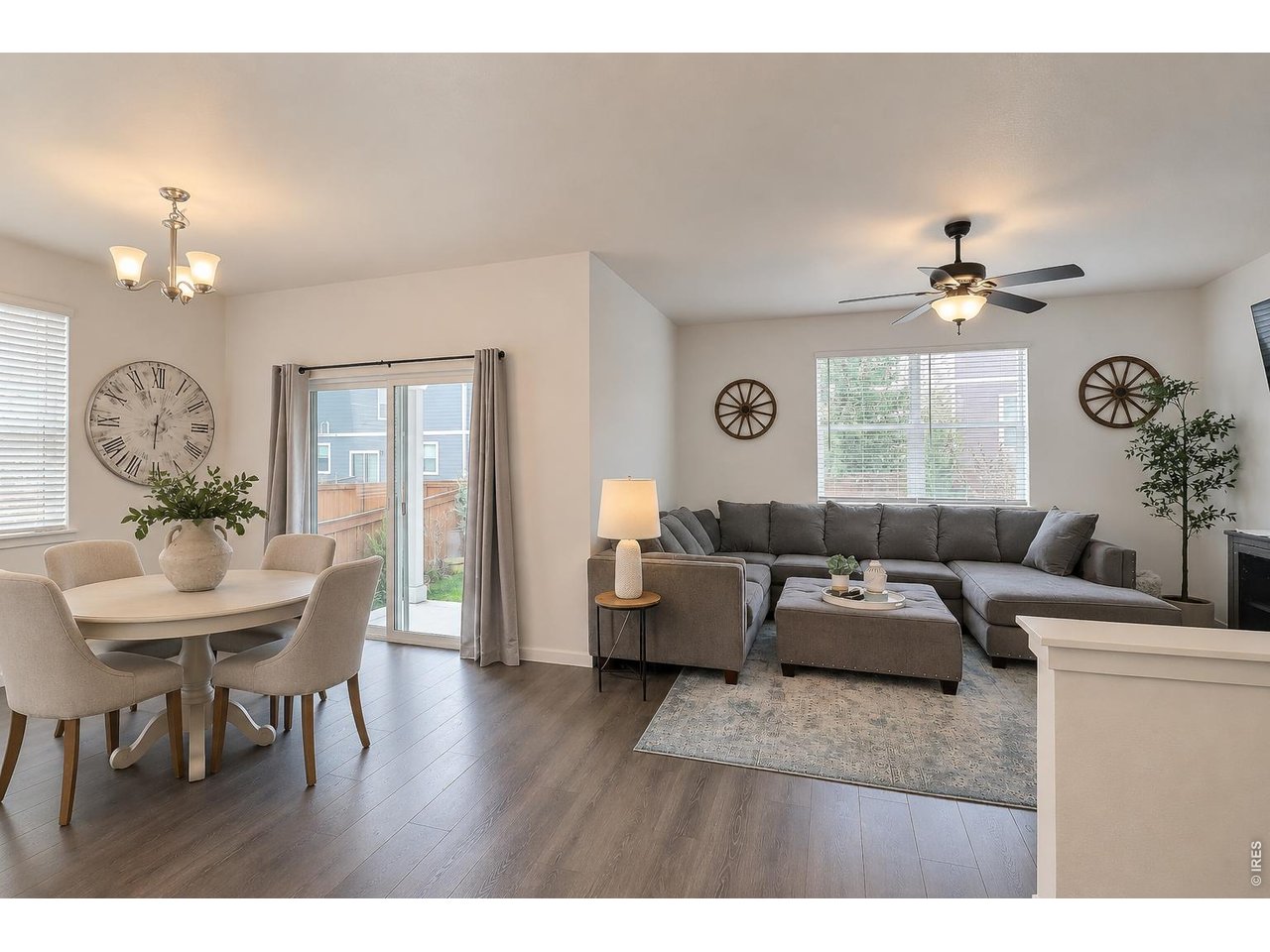 1269 Wild Basin Road Severance, CO 80550 - Photo 17 of 45 Great area for entertaining, sliders for additional space! Photo virtually enhanced
