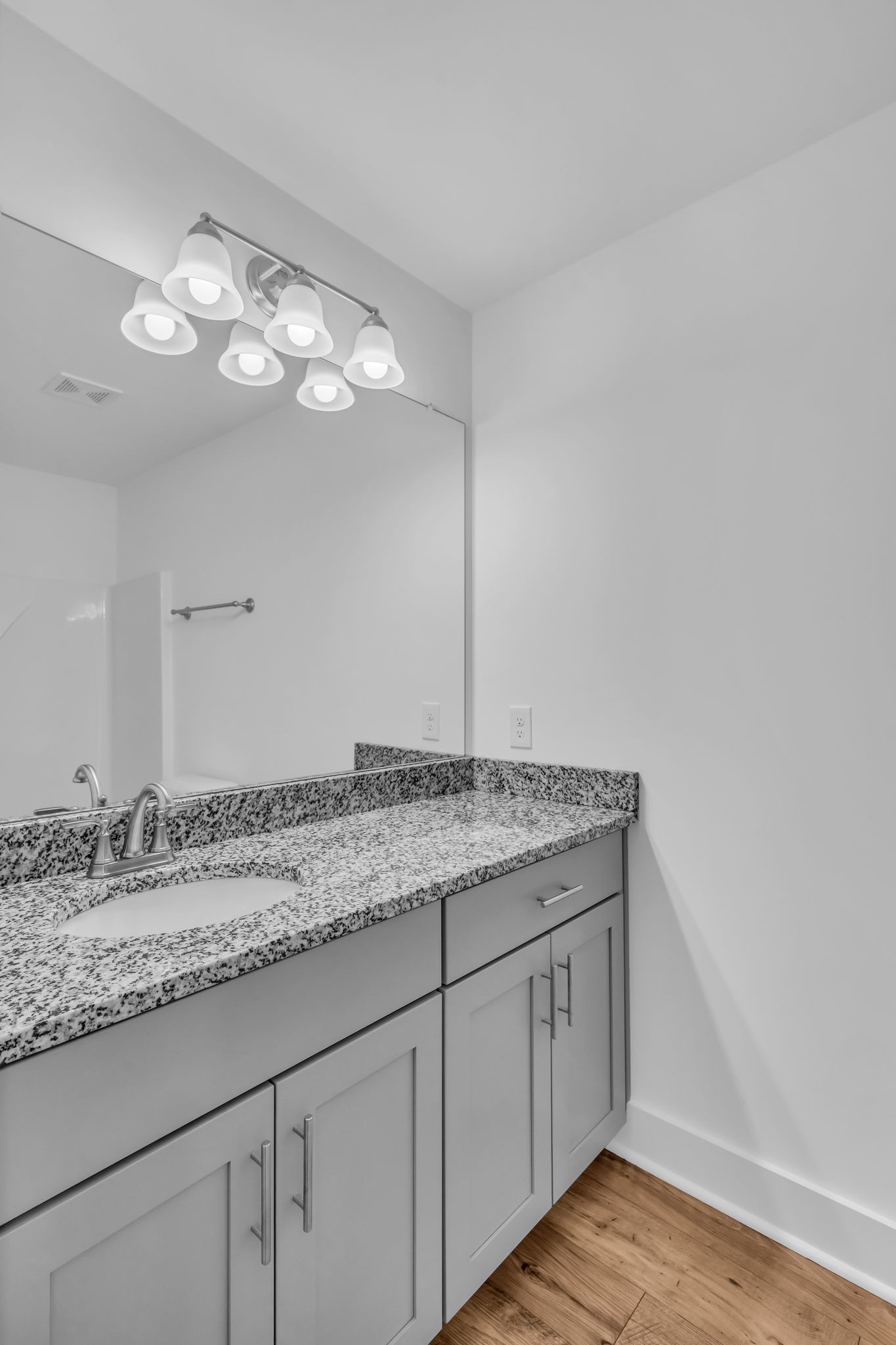 7144 Gracious Drive Franklin, TN 37064 - Photo 21 of 28 a bathroom with a granite countertop sink and a mirror