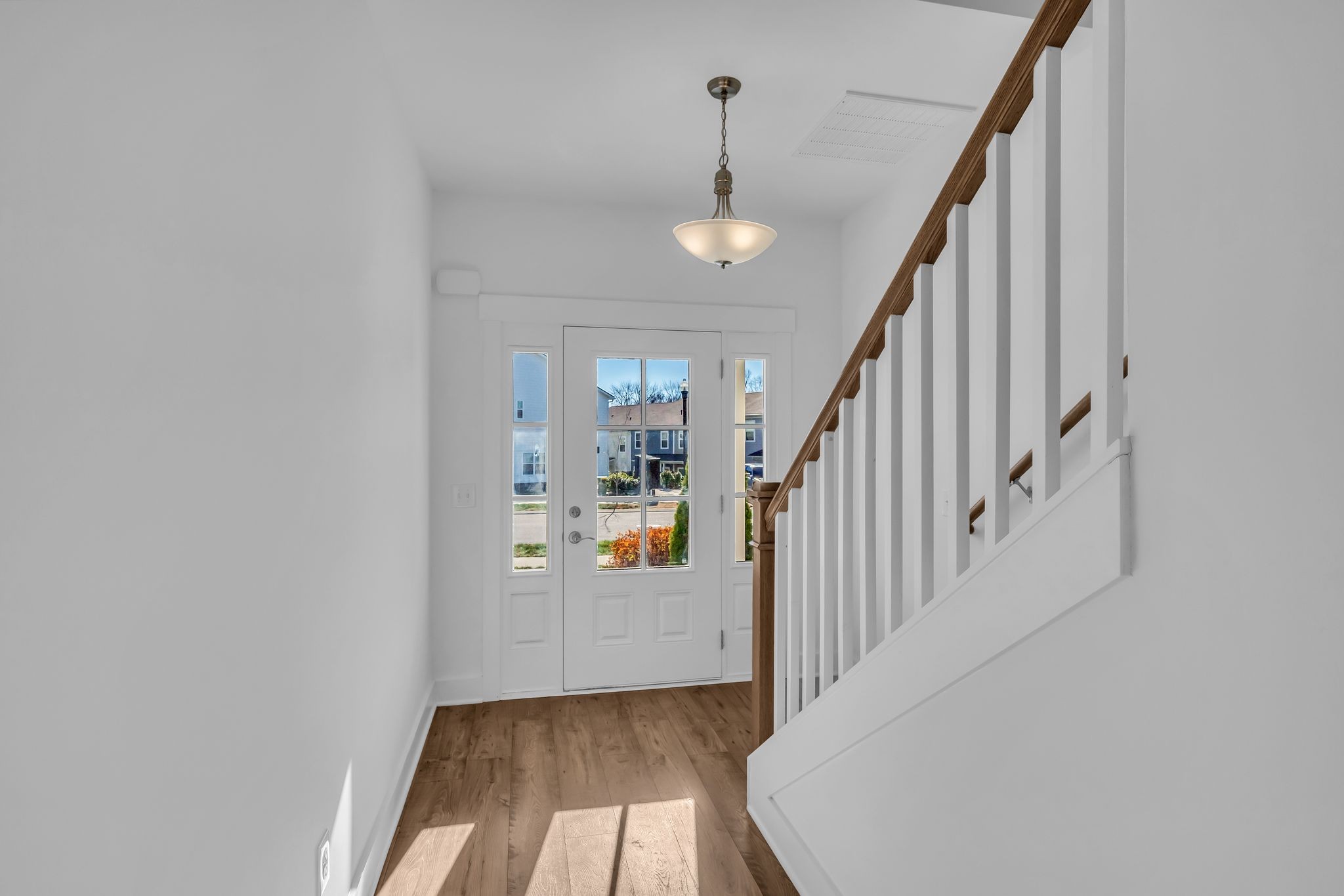 7144 Gracious Drive Franklin, TN 37064 - Photo 5 of 28 a view of an entryway with wooden floor