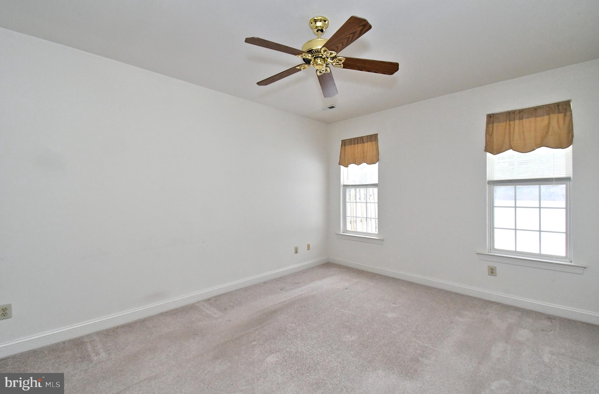 425 Ruth Court Harleysville, PA 19438 - Photo 15 of 26 a view of an empty room with a window