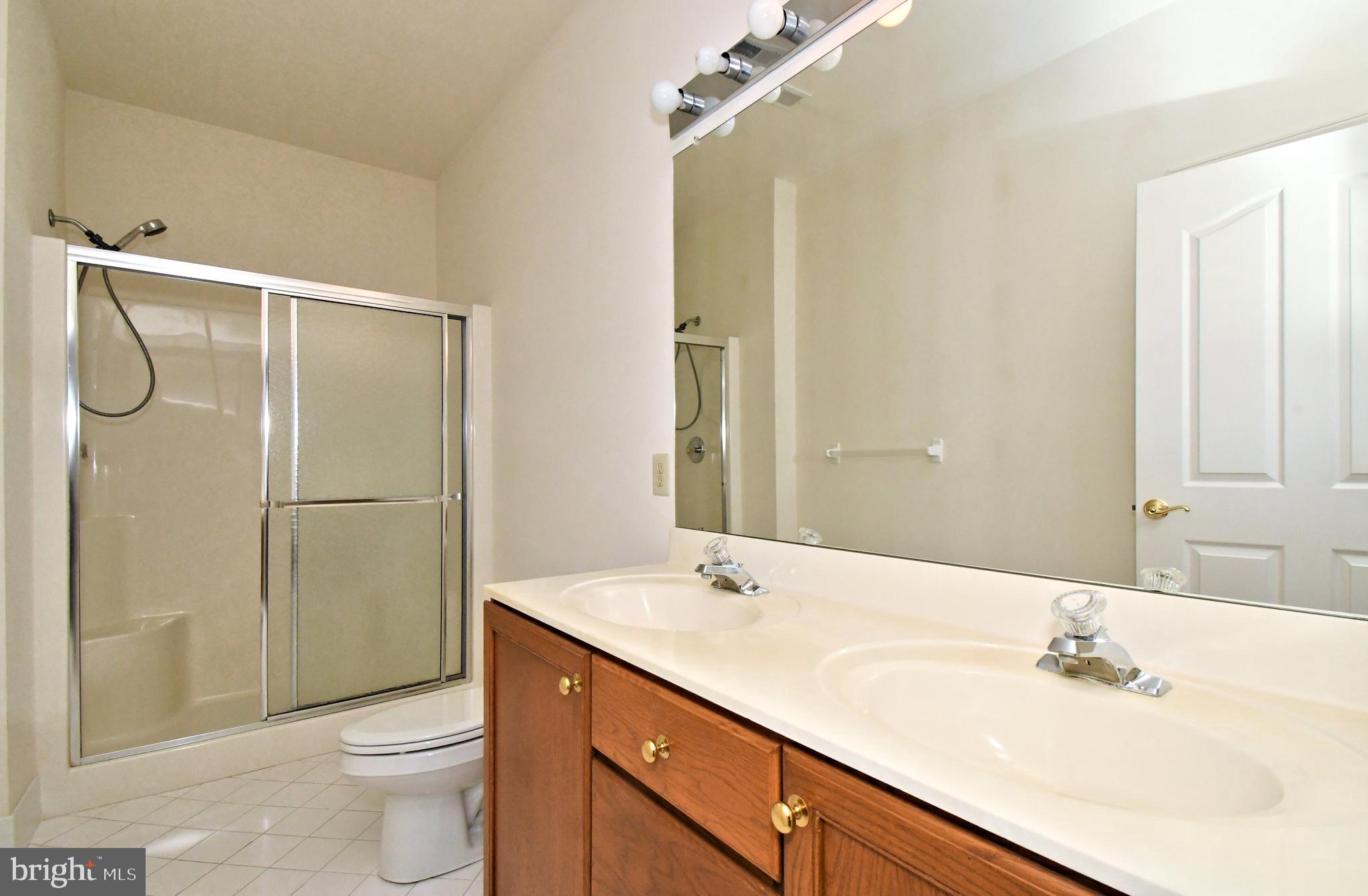 425 Ruth Court Harleysville, PA 19438 - Photo 18 of 26 a bathroom with a sink toilet and shower
