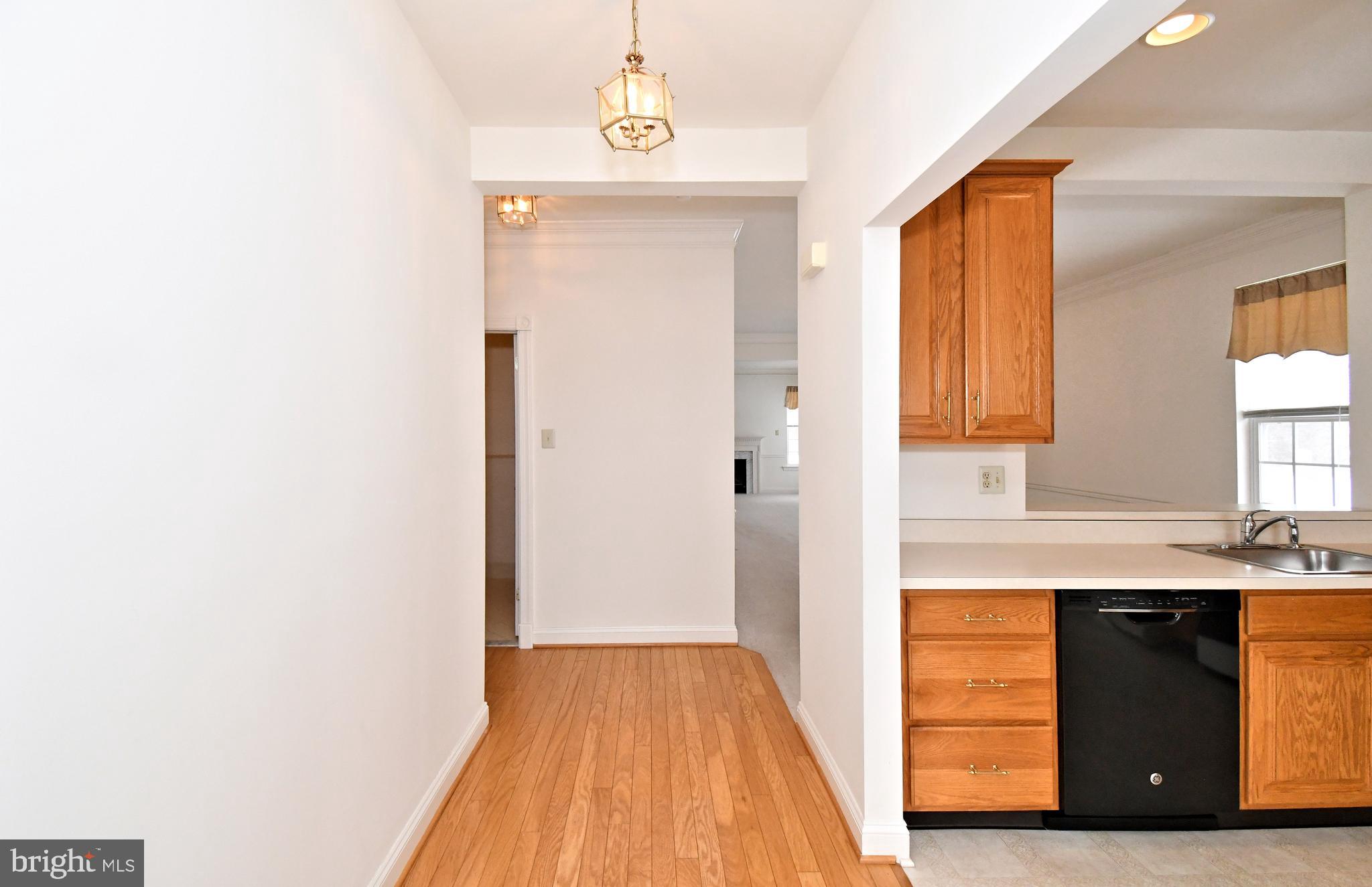 425 Ruth Court Harleysville, PA 19438 - Photo 2 of 26 a view of a kitchen from the hallway